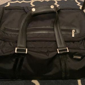 TUMI travel 21” duffel, handle and wheels
